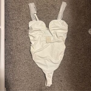 NWT free people bodysuit size large